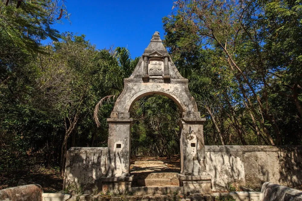 Stone ruins and tropical greenery at Hacienda Mundaca on Isla Mujeres