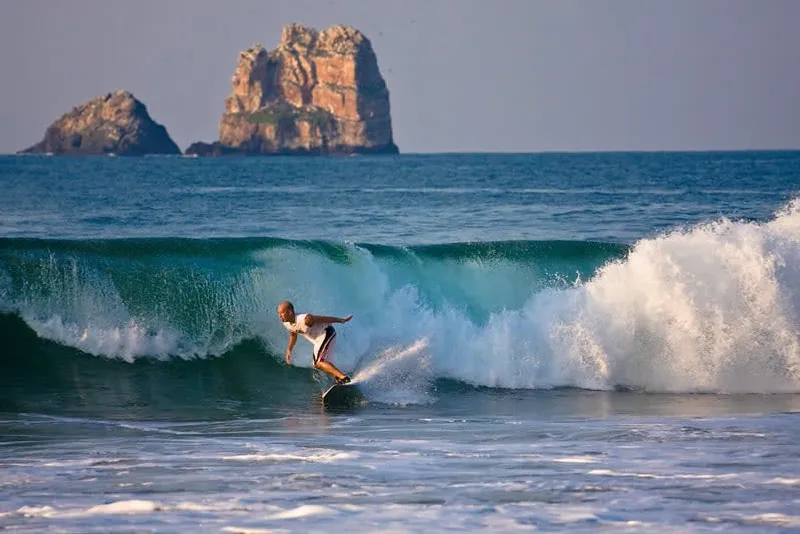 Playa El Palmar in Ixtapa in August with warm Pacific water and late-summer resort planning