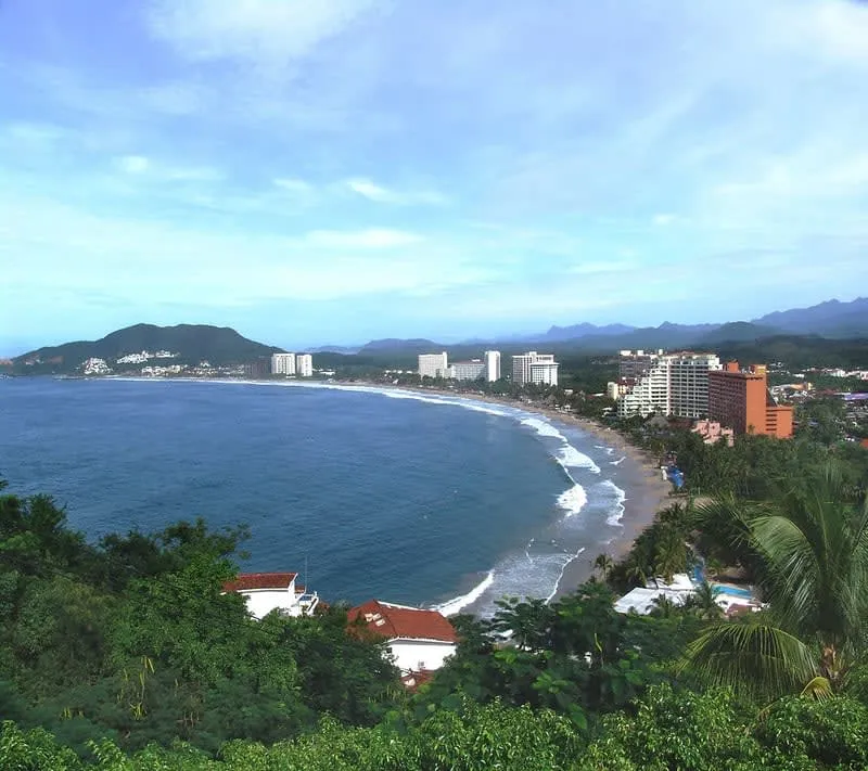 Playa Larga near Zihuatanejo in December with dry-season seafood lunch planning and holiday-week crowd timing
