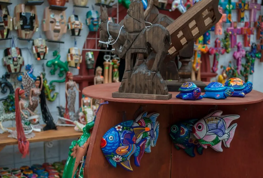 Wood carvings and pottery displayed at the Ixtapan de la Sal weekend artisan market