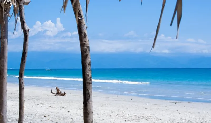 Destiladeras Beach with long pale sand and open Pacific surf