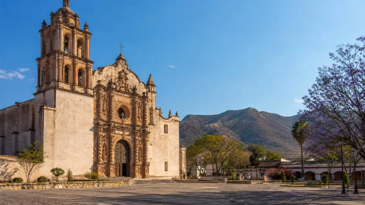 Jalpan de Serra mission in March with dry-season spring light, Sierra Gorda hills, and quiet plaza travel weather