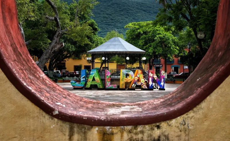 Jalpan de Serra mission in September with Independence season travel planning, green hills, and morning sightseeing