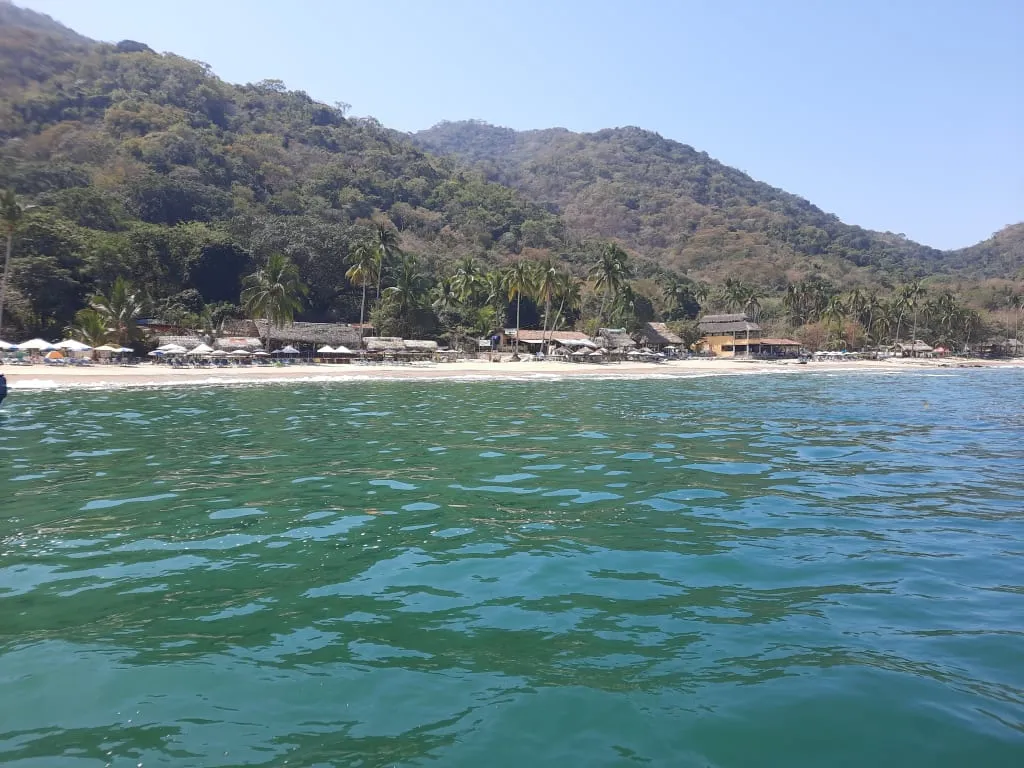 Boats approaching Las Animas after the coastal route from Boca de Tomatlan