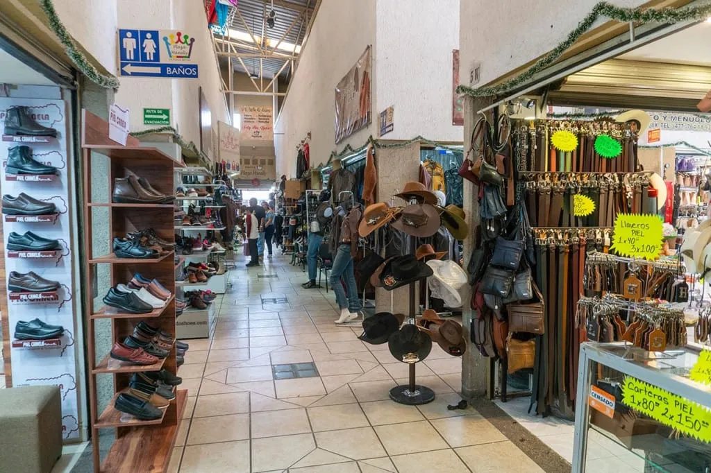 Rows of leather shoes for sale in León shoe shops