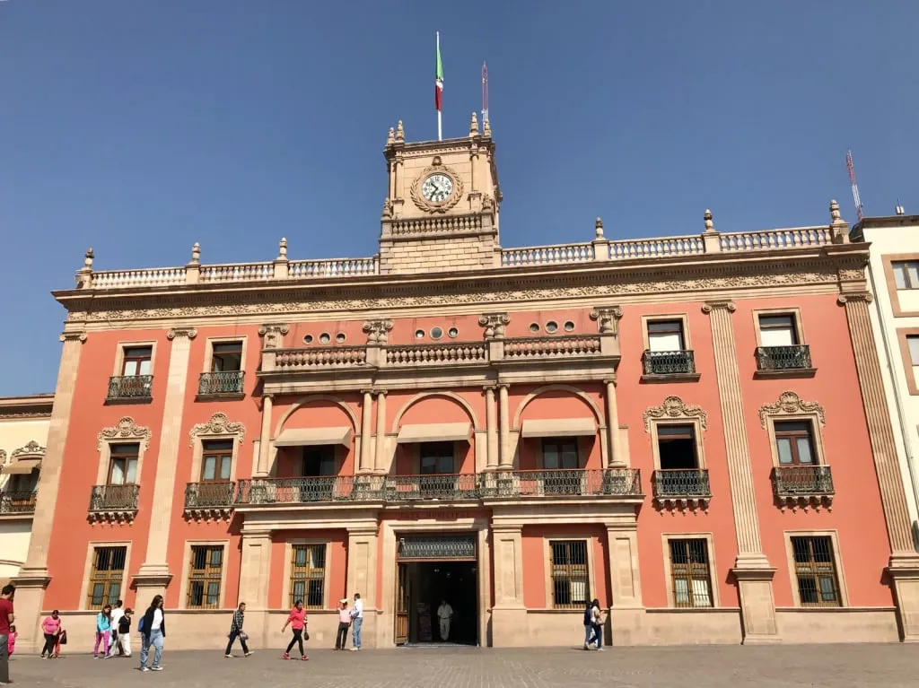 Municipal Palace of León with clock tower and plaza