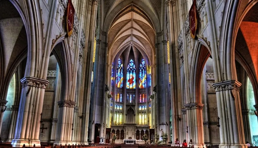 Stained glass and stone columns inside the Expiatory Temple
