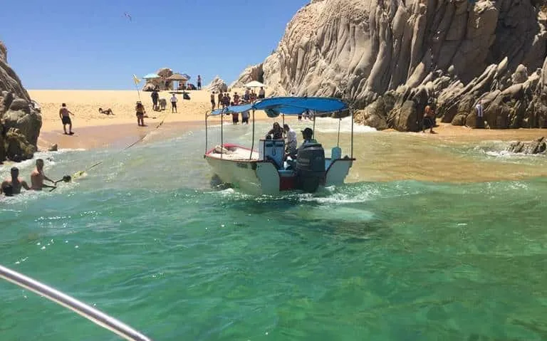Lover's Beach tucked between granite cliffs in Cabo San Lucas