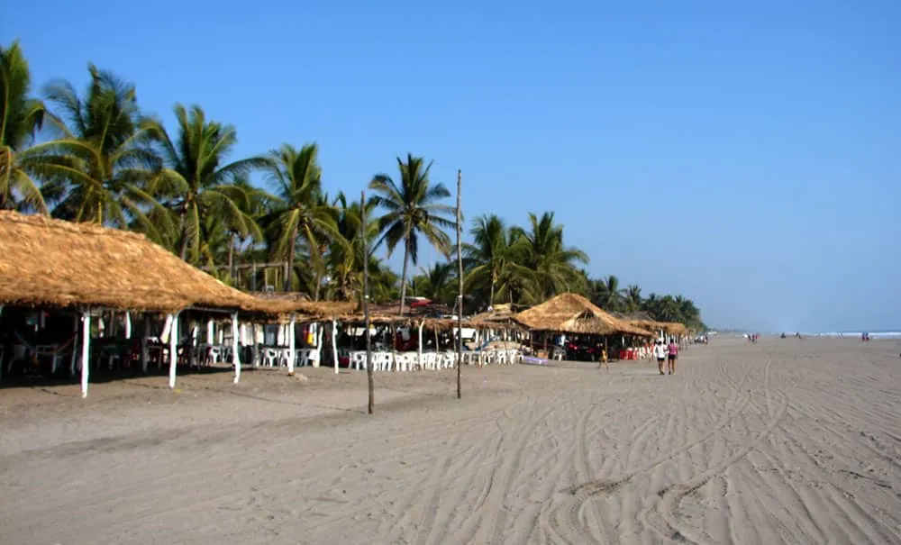 La Manzanilla beach near Barra de Navidad — quiet fishing village 15 km away with an estuary where American crocodiles sun
