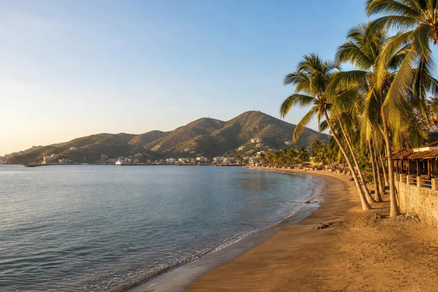 Manzanillo bay and Pacific beach under clear March dry-season light