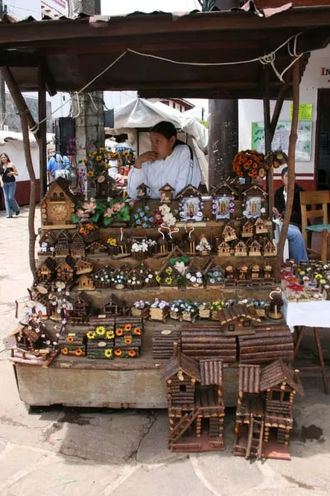 Wooden crafts and woven goods displayed by Mazamitla artisans