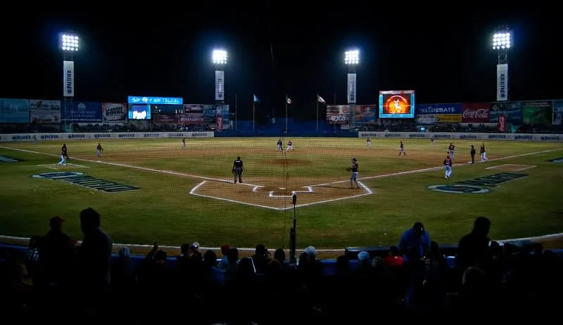 Estadio Teodoro Mariscal baseball stadium in Mazatlan with Venados team game and local crowd under Pacific sunset