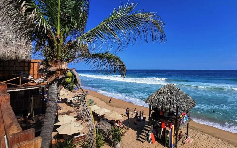 Mazunte beach and rocky Oaxaca Coast scenery during dry December weather