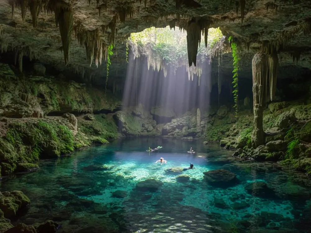 Cenote Xlacah at Dzibilchaltún archaeological ruins near Mérida Yucatán, crystal clear swimming