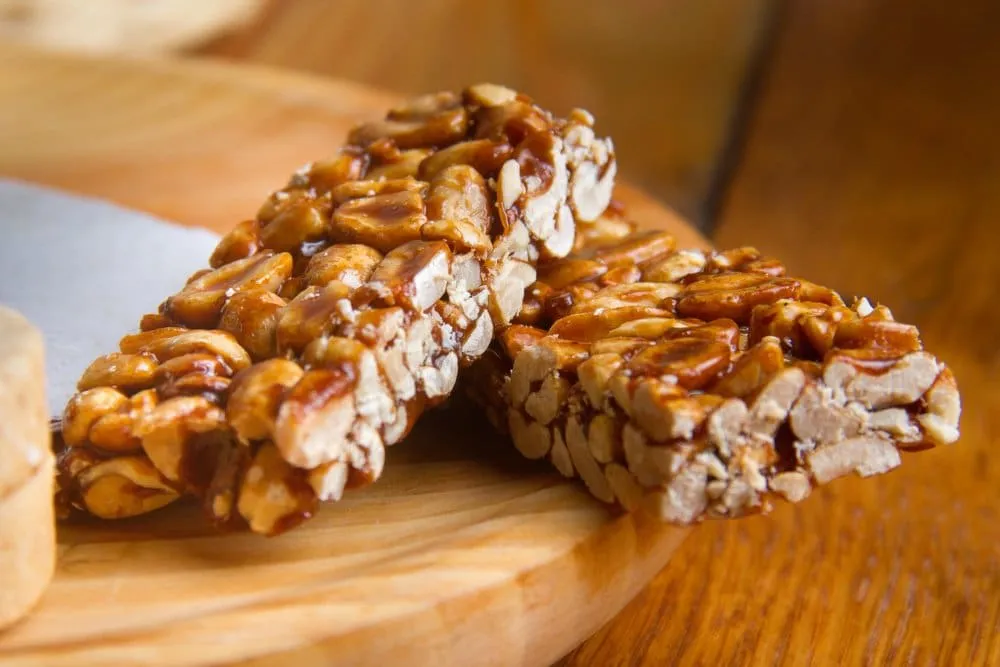 Crunchy peanut palanquetas set in glossy piloncillo syrup