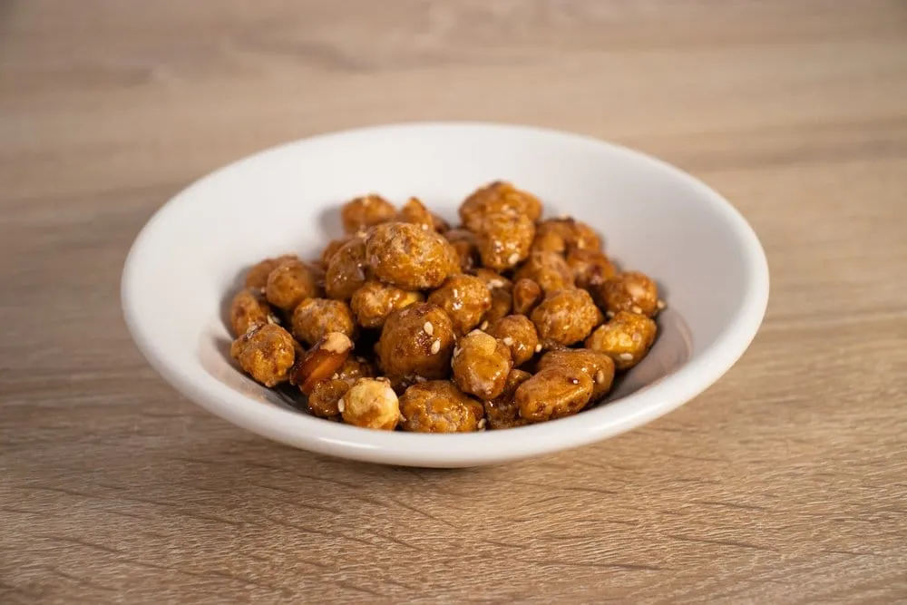 Garapiñado peanuts with a glossy caramelized sugar coating