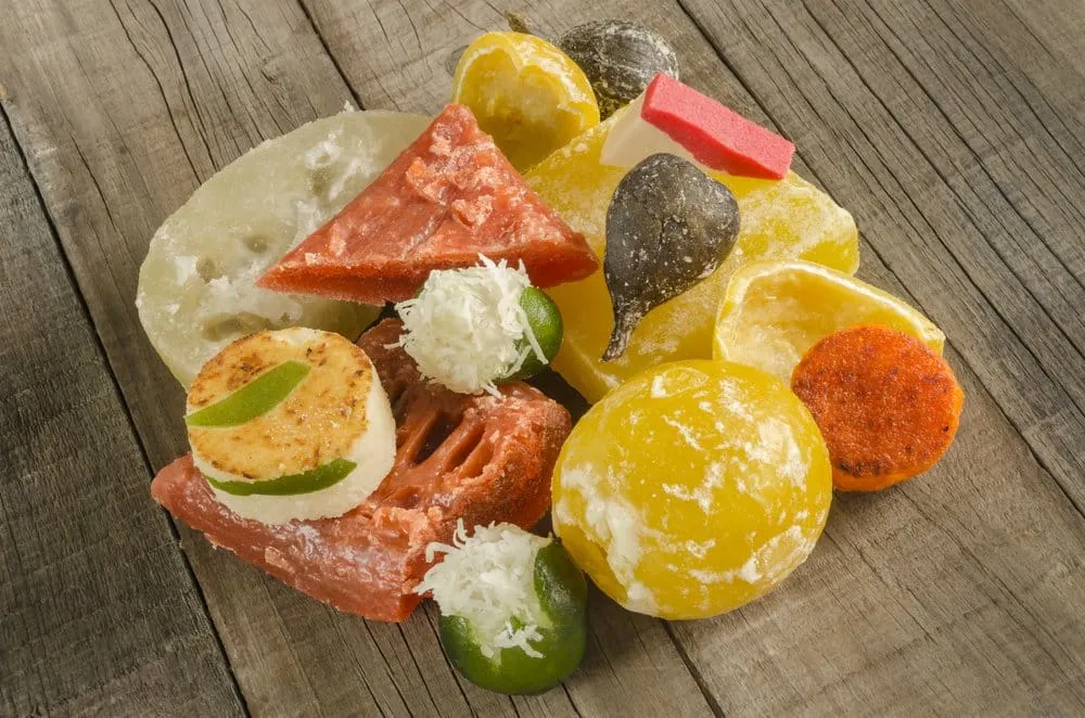 Candied fruits in bright slices at a traditional sweet stall