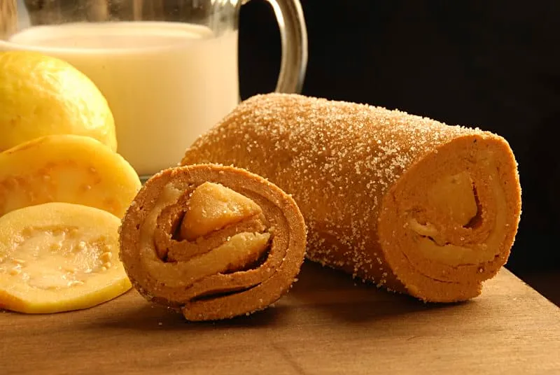 Guava rolls filled with cajeta and sliced for serving
