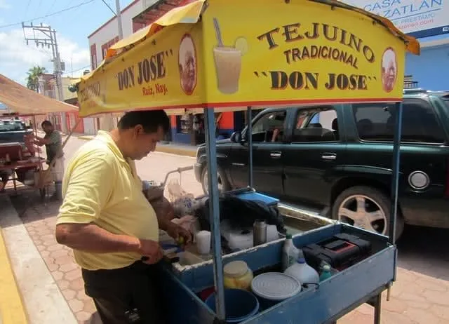Tejuino fermented corn drink in Jalisco Mexico — street drink with lime sorbet served in a cup