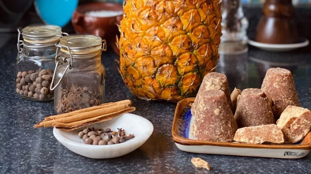 Tepache Mexican fermented pineapple drink with cinnamon and piloncillo — low alcohol traditional drink