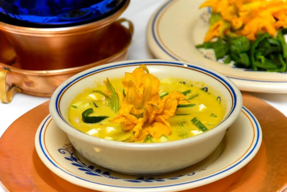 Bright squash blossoms arranged for soups, quesadillas, or stews