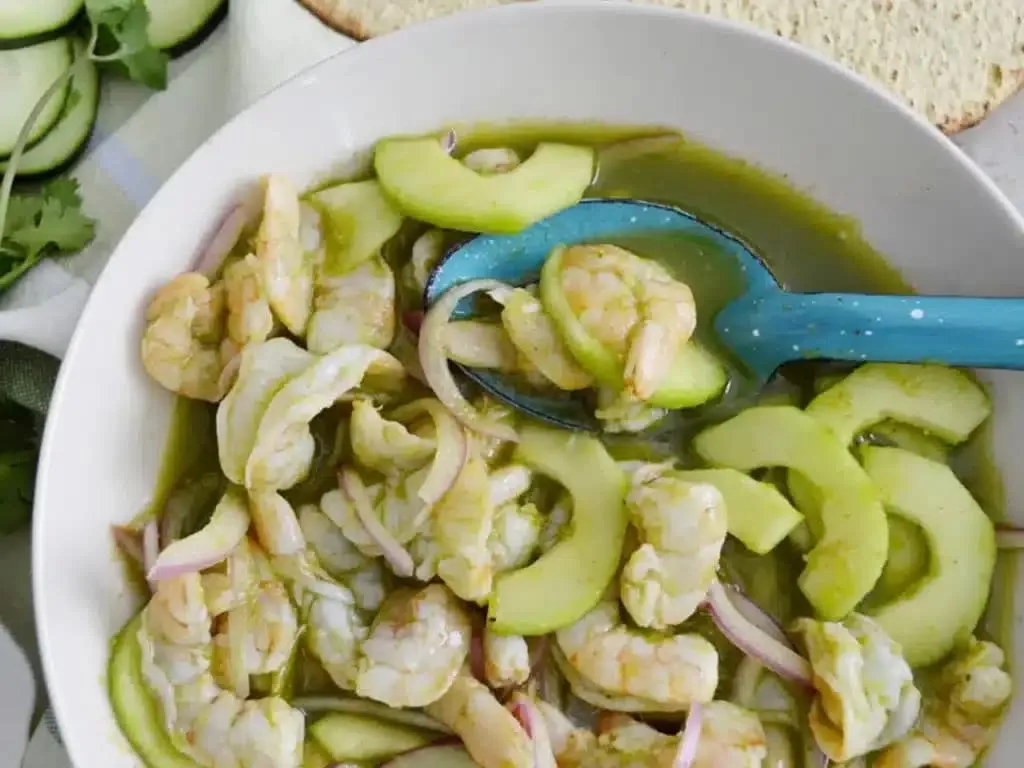 Shrimp aguachile with cucumber, red onion, lime, and chile