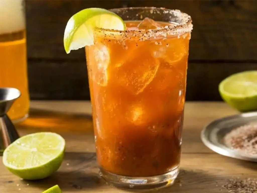 Michelada Cubana served in a chilled beer mug with lime