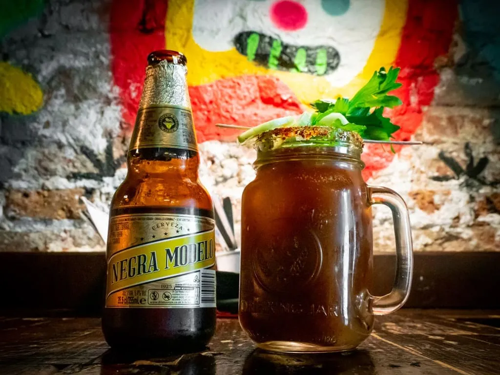 Diabla michelada mixed with tequila, lime, and hot sauce