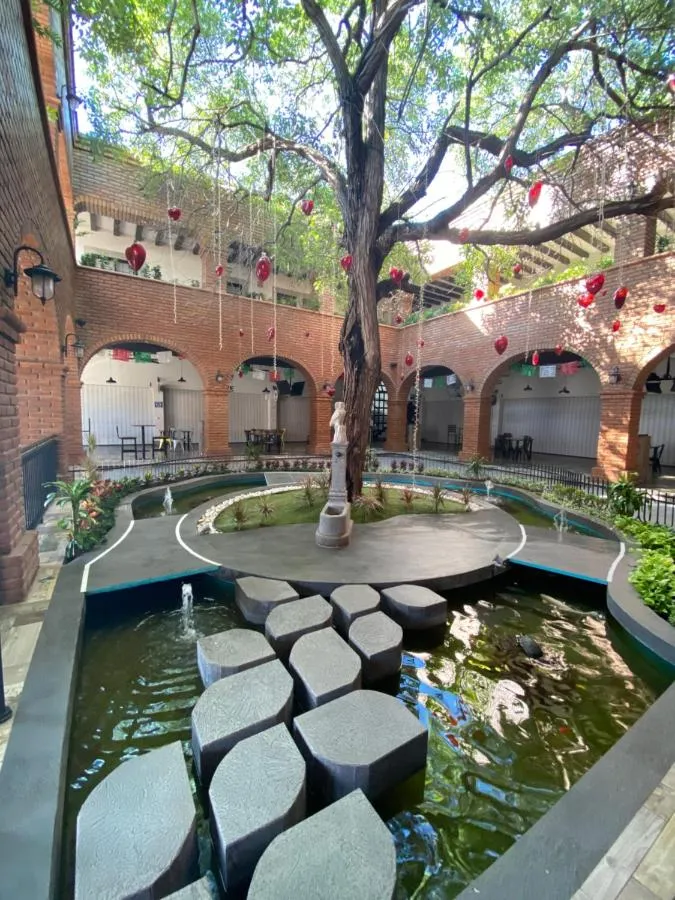 Colonial-style hotel lodging with balcony in Mocorito