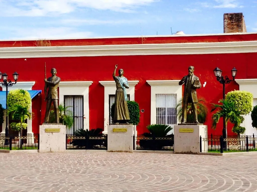 Bronze statues in Los Tres Grandes civic plaza in Mocorito