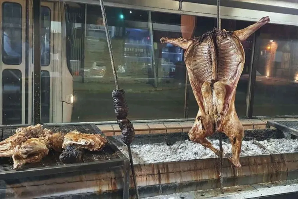 Cabrito al pastor — the signature dish of Monterrey, roasted baby goat you'll miss in Cancun