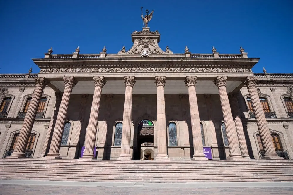 Carne asada on mesquite grill at Monterrey restaurant with arrachera skirt steak and flour tortillas