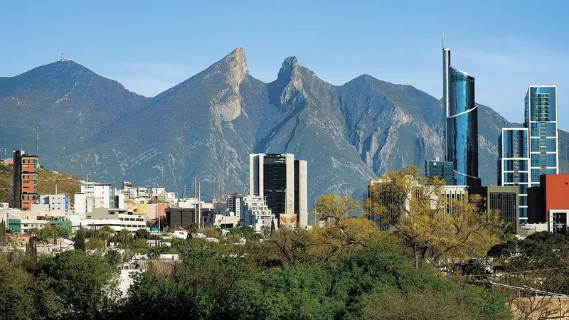 Monterrey skyline with Cerro de la Silla mountain — MTY airport is Mexico's third busiest after MEX and CUN