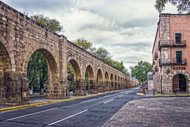 Morelia aqueduct stretching along a broad city street