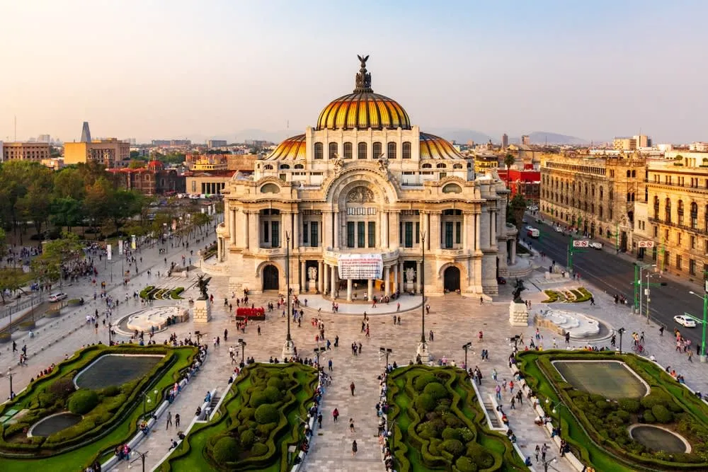 Mexico City skyline with historic landmarks and mountain backdrop