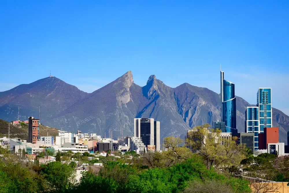Monterrey city skyline below Cerro de la Silla mountain