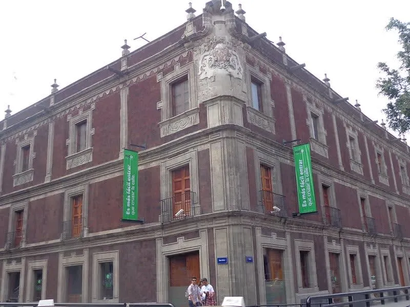 Interactive economics museum exhibit inside a restored historic building