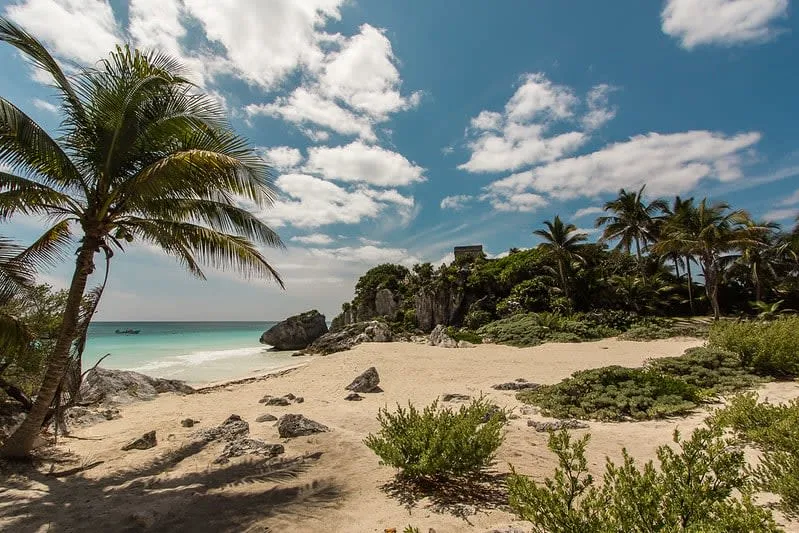 Tulum ruins above Caribbean water inside Tulum National Park.