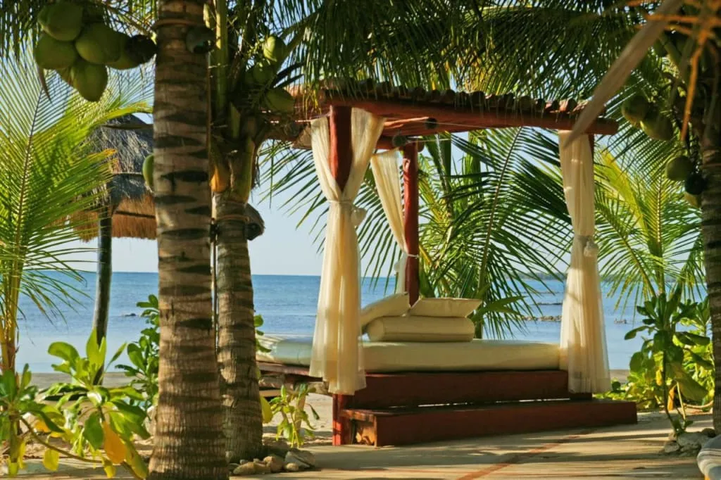 Hidden Beach Resort private beachfront cabin at sunrise, Riviera Maya Mexico