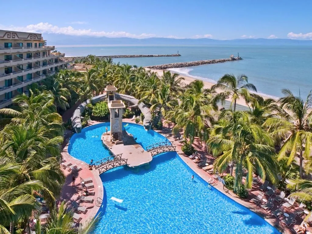Paradise Village Beach Resort pool and palm-lined grounds