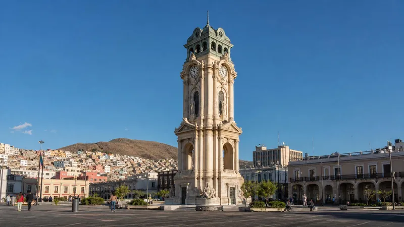 Pachuca clock tower and central plaza during clear April weather in Hidalgo
