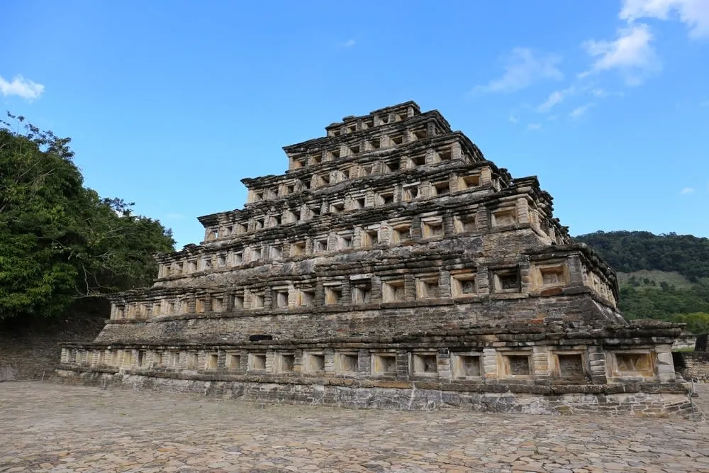 Stone platforms and green lawns inside the El Tajín archaeological zone
