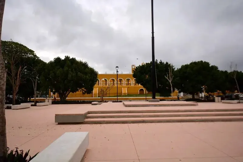 Central park and yellow colonial buildings in Izamal for August Yucatán travel planning