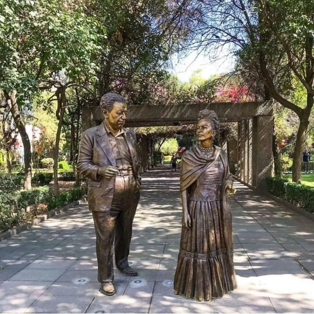 Frida Kahlo Park bronze statue and bougainvillea in Coyoacan