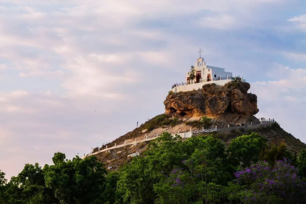 Santo Madero chapel on a rocky hill above the desert valley
