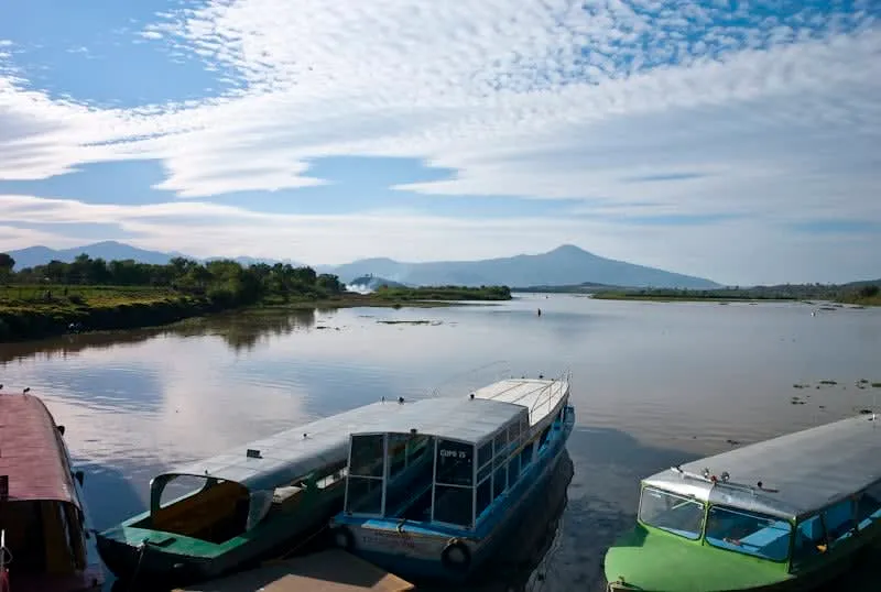 Lake Pátzcuaro at sunset with traditional fishing canoes, Michoacán