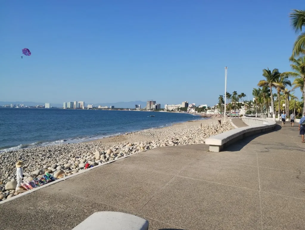 Puerto Vallarta Romantic Zone boardwalk at night with string lights and outdoor dining