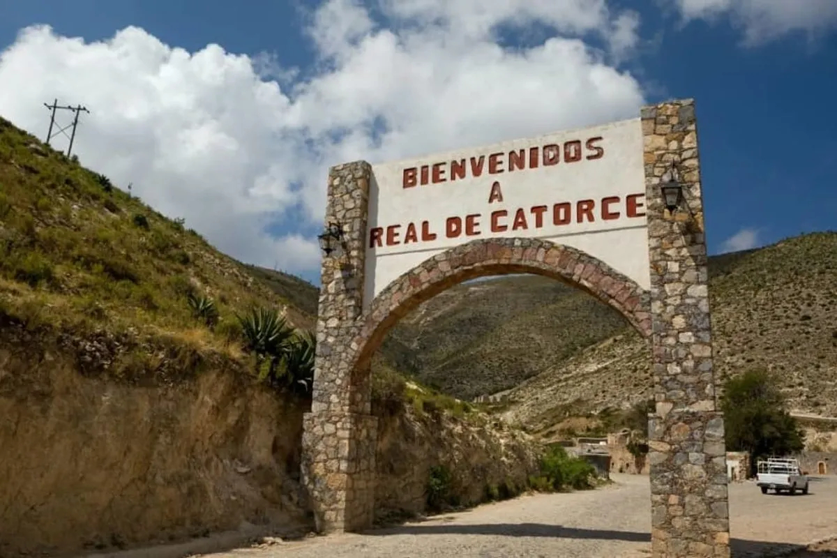 Stone street and desert hillside in Real de Catorce under winter sun