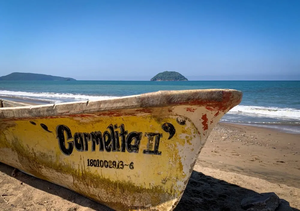 La Peñita de Jaltemba shoreline with palms, sand, and gentle surf