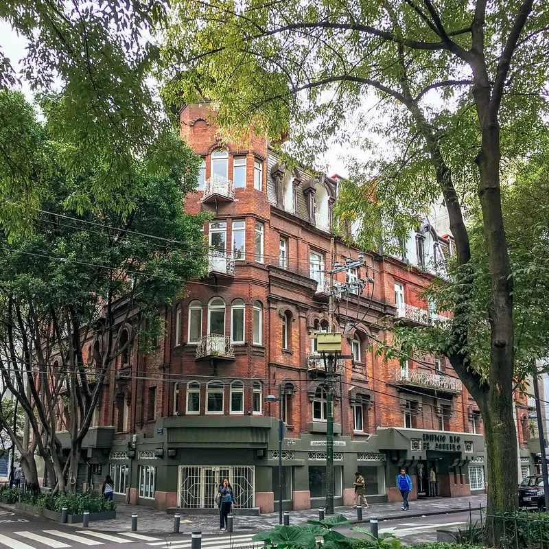 Orizaba Street corner with restored facades and tall street trees